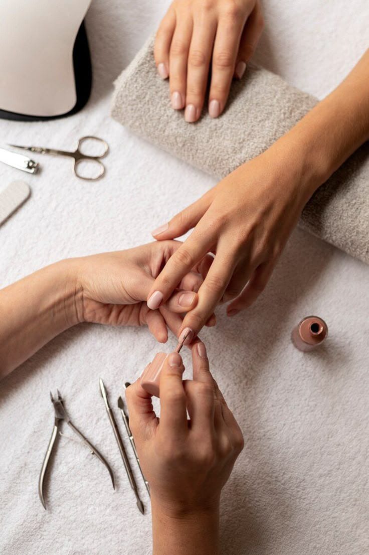 Professional hair dyeing process showing hair color application with professional tools and color mixing in a modern salon