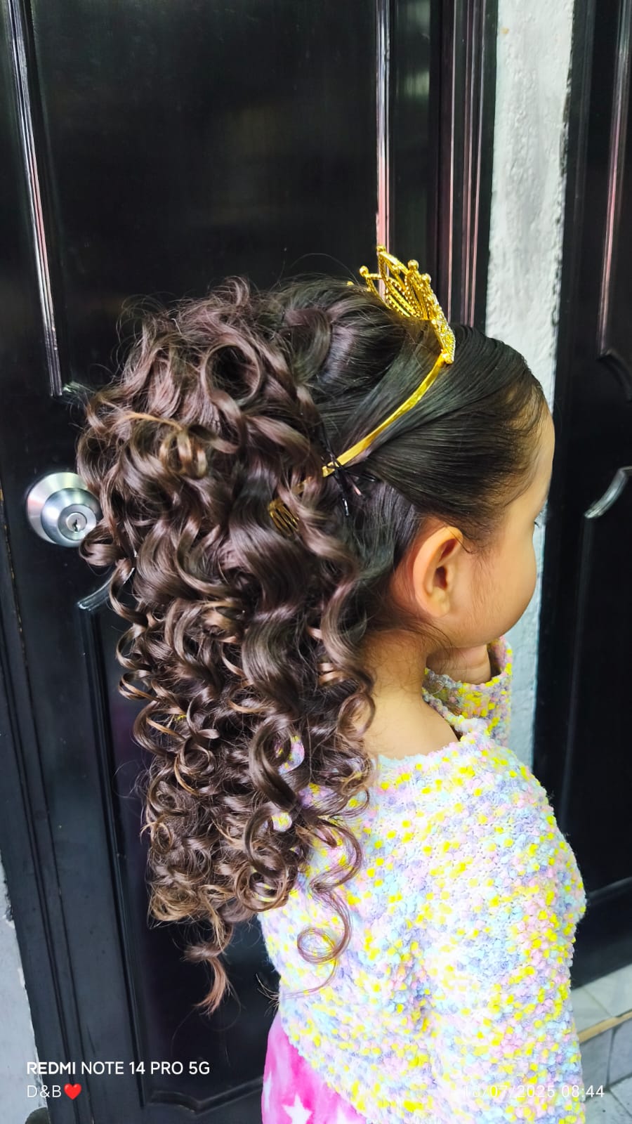 Professional hair dyeing process showing hair color application with professional tools and color mixing in a modern salon